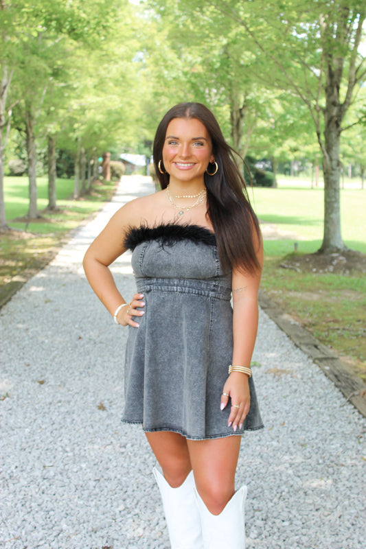 Feather in Black Dress